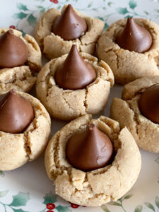 These Almond Butter Thumbprint Cookies are an almondy version of the classic peanut butter blossom cookies. They are made with some healthier ingredients, making them a great addition to your Christmas cookie lineup!